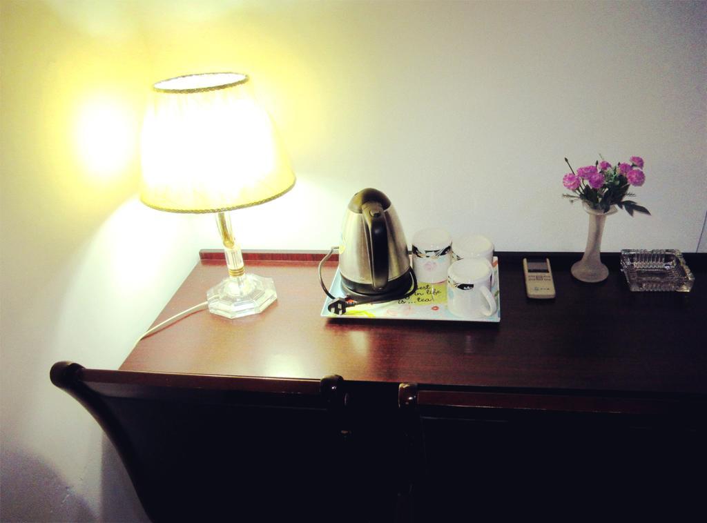 25°C Four Season Youth Hostel Qingdao Zimmer foto