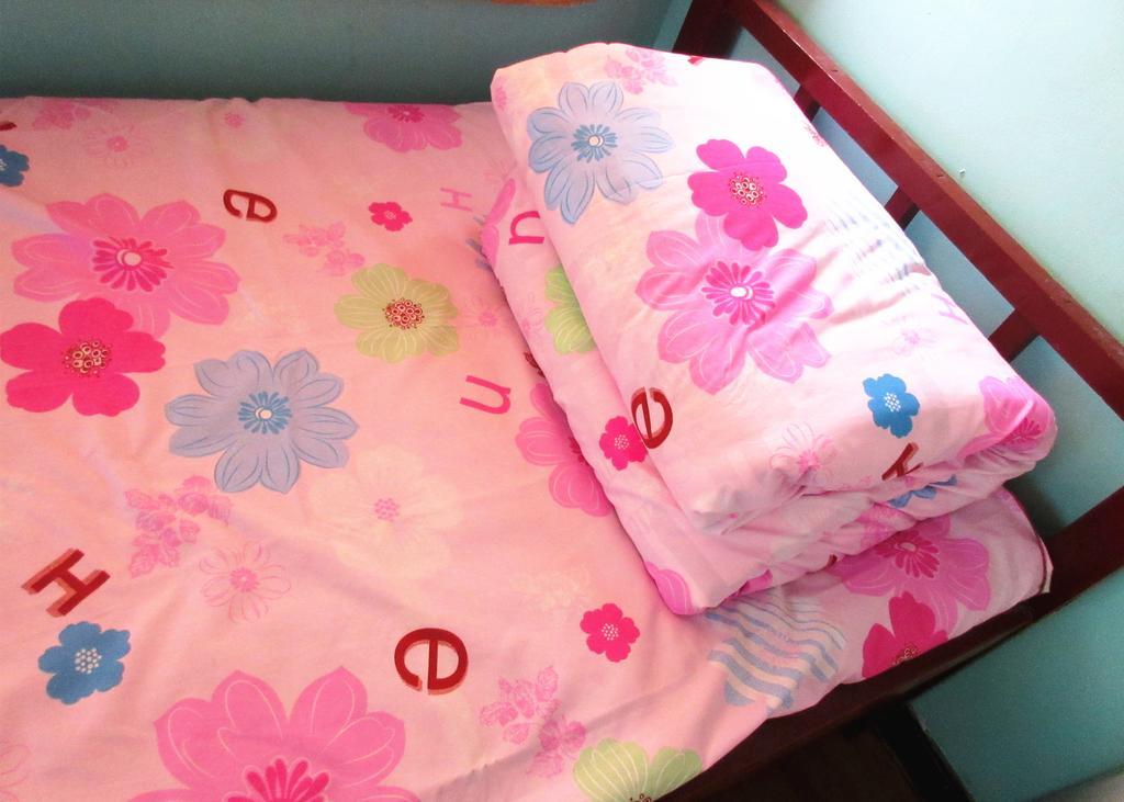 25°C Four Season Youth Hostel Qingdao Zimmer foto